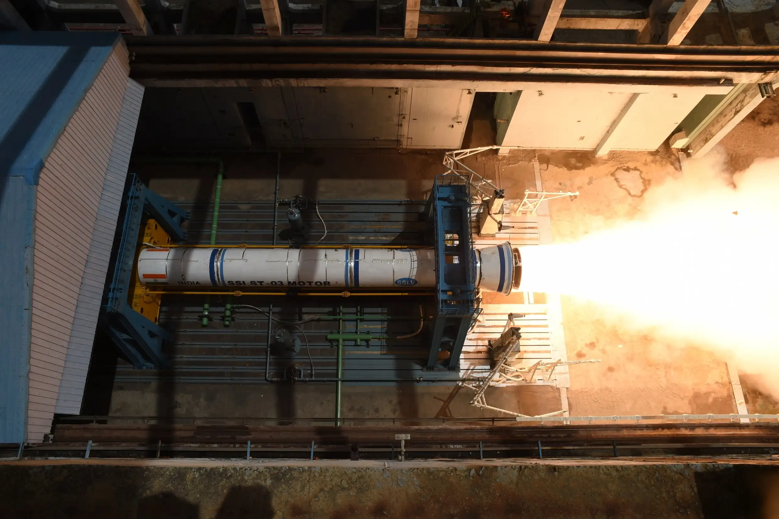 Improved SSLV first-stage solid motor firing horizontally during a ground static test
